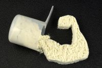 Performance supplement protein powder scoop arm tensing